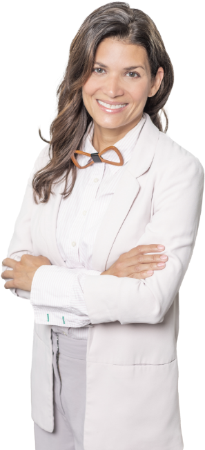 Boston prosthodontist Dr. Schrott smiling with arms folded